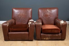 A pair of Art deco style brown leather upholstered armchairs each 80cm wide x 85cm deep x 80cm