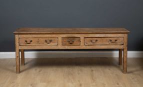 A 19th century pine three drawer dresser base (cut down) 71cm wide x 48cm deep x 64cm
