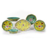 Straits yellow ground shaped dish Chinese, painted with flowers in polychrome enamels, 30cm across