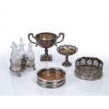 Collection of silver and silver-plated items to include: Three-piece glass cruet set on silver