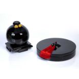 Two Vietnamese black lacquered boxes one and an hors d'oeuvres box with cover, 30cm across, the