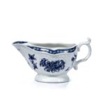 Worcester porcelain sauce boat circa 1770, blue and white with a crescent mark to the underside,