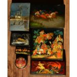 Collection of Russian lacquered boxes some signed of various shapes and measurements, one of a