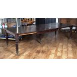 Mahogany Gillows style extending dining table on turned and reeded supports with original castors