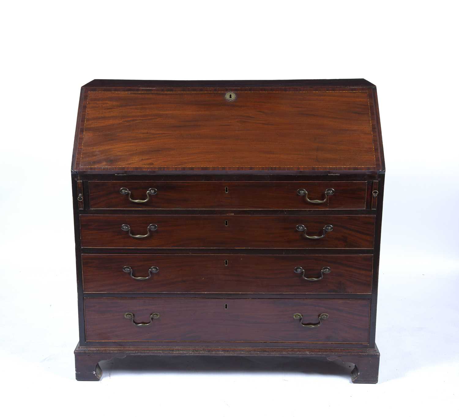 Mahogany bureau George III with fitted interior and inlaid fall front and with drawers below,