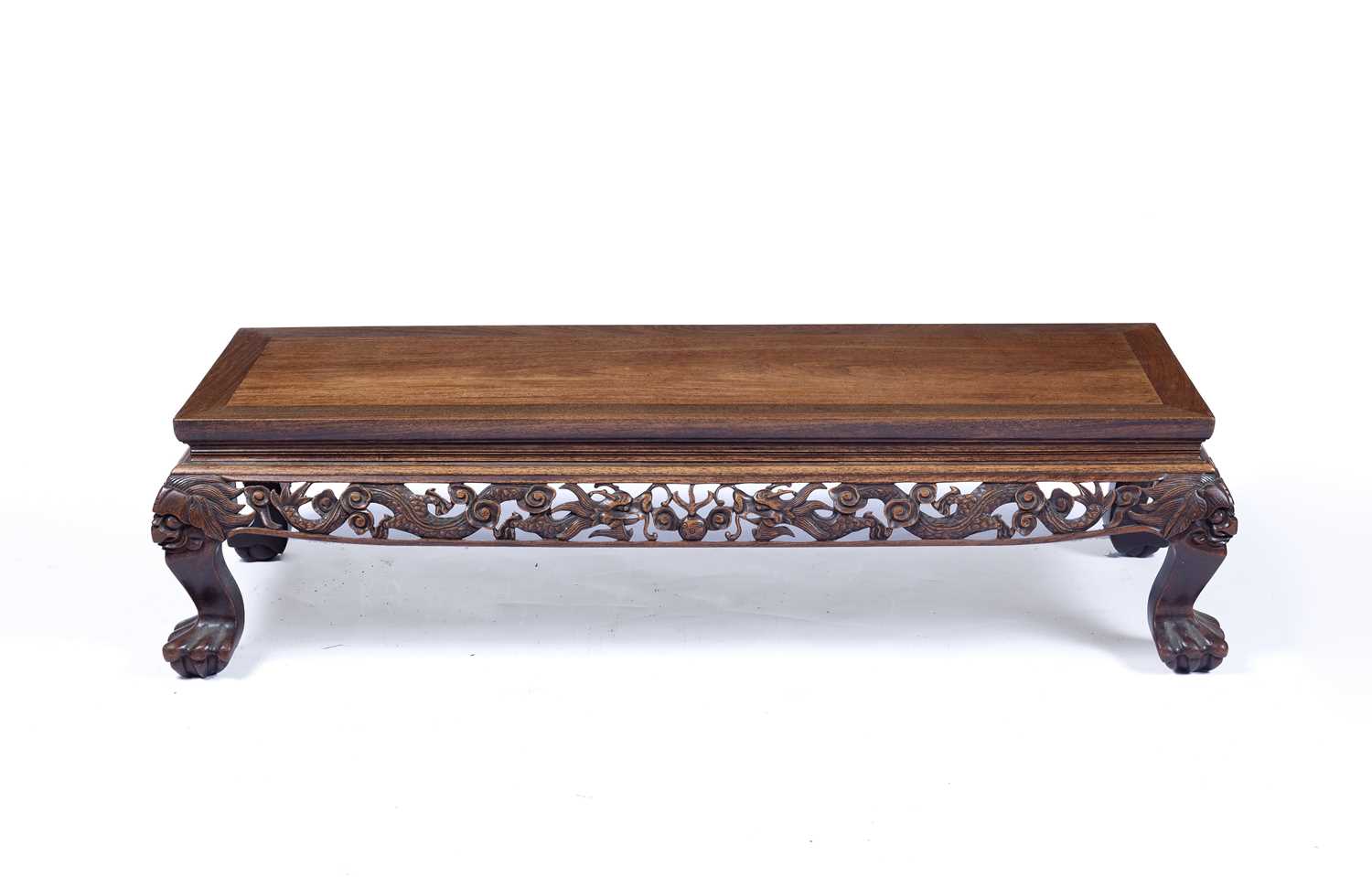 Carved hardwood low table Chinese, with dragon carved decoration, 116cm x 45cm, 31cm highCondition