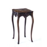 Oak shaped occasional table French, late 19th Century, with carved decoration and shaped supports,