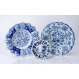 Two early Delftware lobed dishes and a miniature dish or stand, all circa 1680-1700, painted in blue