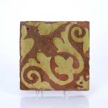 Medieval tile 15th-16th Century with stylised oak leaf design, 13.5cm squareCondition report: