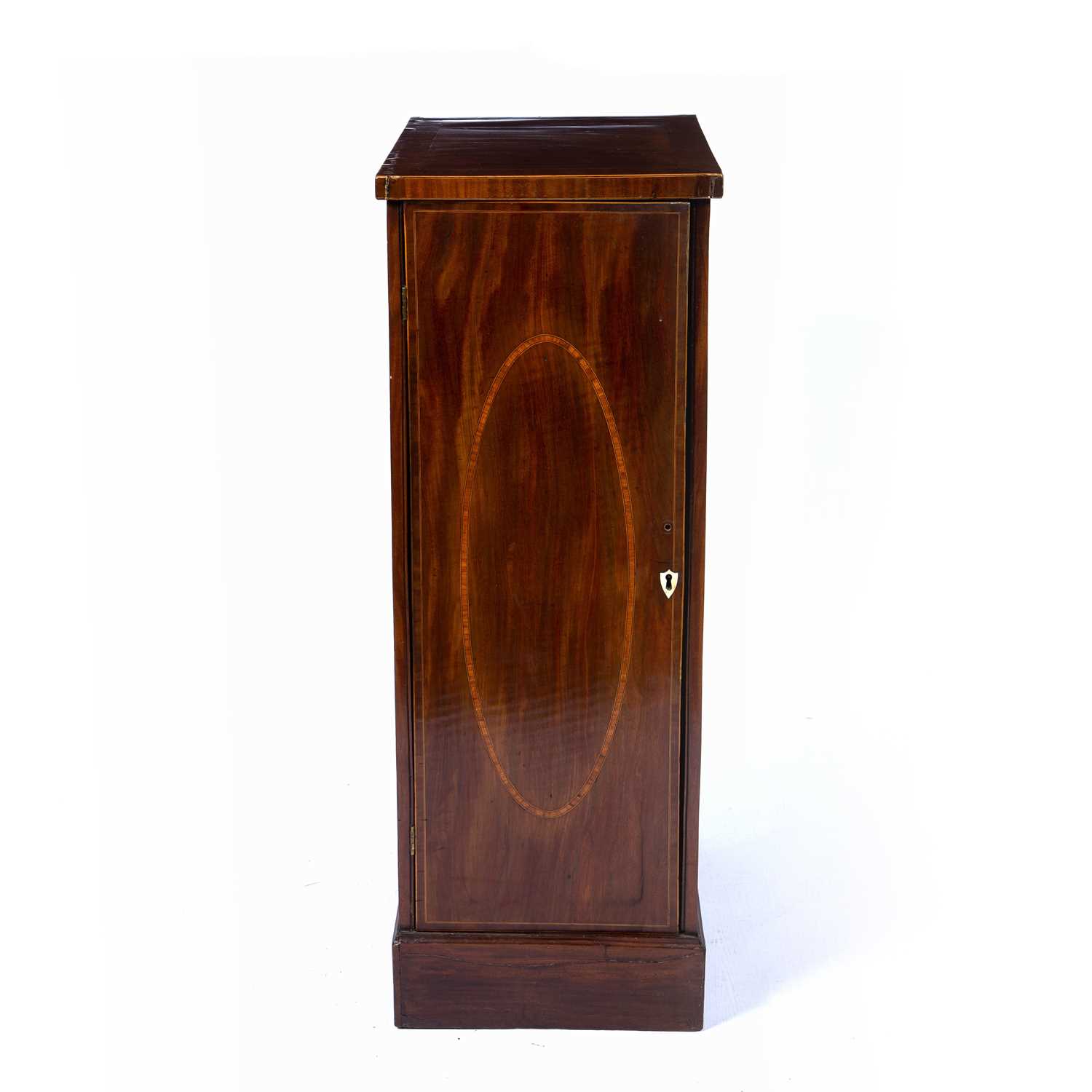 Mahogany and satinwood inlaid pedestal cupboard 19th Century, with oval inlaid door enclosing