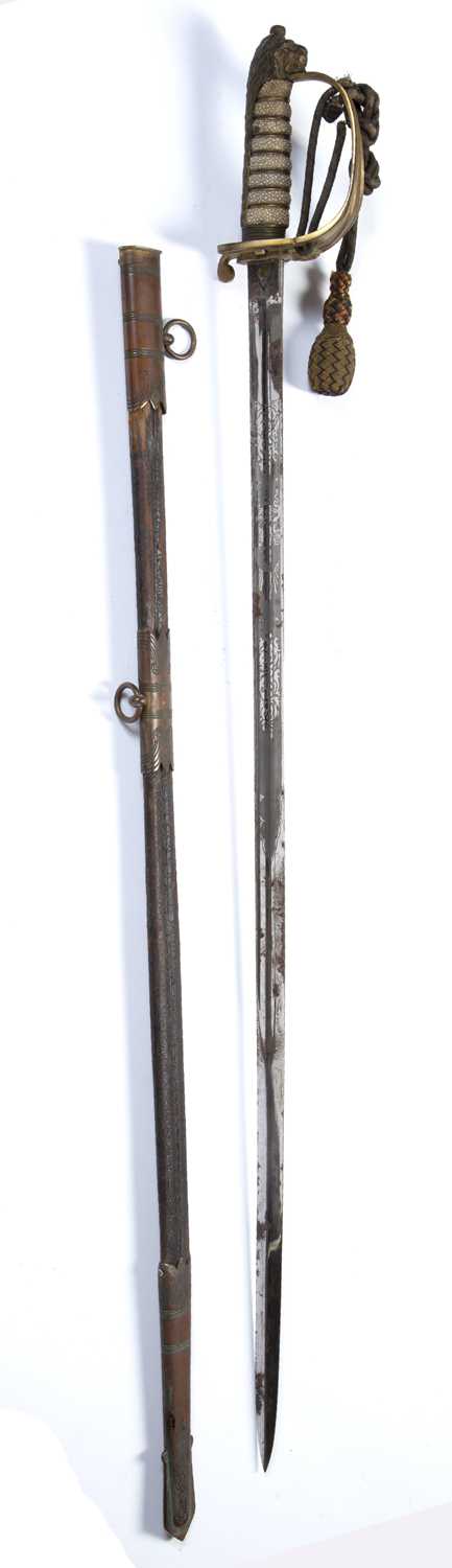 Naval dress sword by J W Taylor of Chatham, in a leather metal scabbard and outer caseCondition