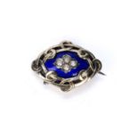 French enamel and half pearl panel brooch the oval blue enamel panel centred with a half pearl