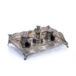 Victorian silver ink stand with pierced gallery back, standing on four scallop shell feet, bearing