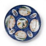 Polychrome Delftware charger possibly London ca.1730 with geometric leaf and flower decoration, 34.