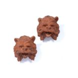 Pair of terracotta mythological monkeys in the form of open topped wall mounts, 14cm x 19cm