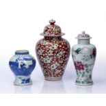 Three Chinese vases 19th Century, comprising of a coral red ground lidded vase decorated with