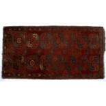 Bokhara red ground rug Turkish, with elephant foot medallions, 210cm x 109cmCondition report: Some