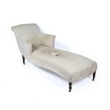 Chaise longue Edwardian, with calico cover on turned supports, approximately 210cm long x 70cm