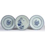 Three blue and white platesChinese, 18th/19th Century, comprising of a pair depicting a central