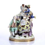 Meissen figure group 'The Good Mother' modelled as a mother sitting in an armchair with her three