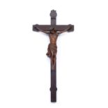 Corpus Christi carved boxwood Christ on an oak cross, 66cm highCondition report: Losses and chips,