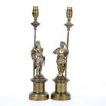 Pair of brass table lamps each in the form of a medieval figure on a plinth base, 45cm highCondition