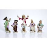 Group of five Meissen 'Monkey band' porcelain figures with blue crossed swords marks and impressed