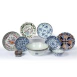 Group of Chinese and Japanese ceramics to include three 18th/19th-century blue and white plates, a