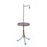 Mahogany and brass lamp table French, 135cm high x 44cm wideCondition report: At present, there is