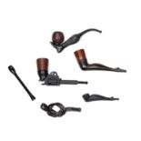 Collection of vulcanite smoking pipes to include one in the form of a footballers leg kicking a