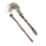 Two beadwork ceremonial sticks African, circa 1900 Condition report: small losses to the beadwork