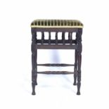 In the manner of Edward William Godwin (1833-1886) stool with striped upholstery, unmarked, 41cm x