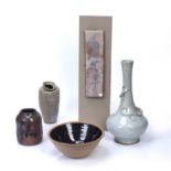 Group of five ceramics to include a St Ives bowl 21cm across, a Japanese ribbed vase with waisted