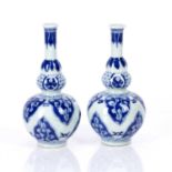 Pair of blue and white gourd vases Chinese, Kangxi style but later, with auspicious symbols, 18.