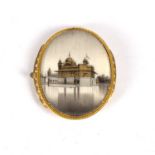 Indian painted miniature on ivory depicting a temple by a river, painted on ivory with a brass