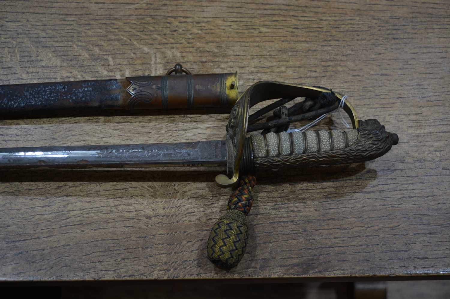 Naval dress sword by J W Taylor of Chatham, in a leather metal scabbard and outer caseCondition - Image 7 of 14