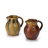 John Jelfs (b.1946) at Bourton-On-The-Water two studio pottery jugs, one with red decoration, 13.5cm