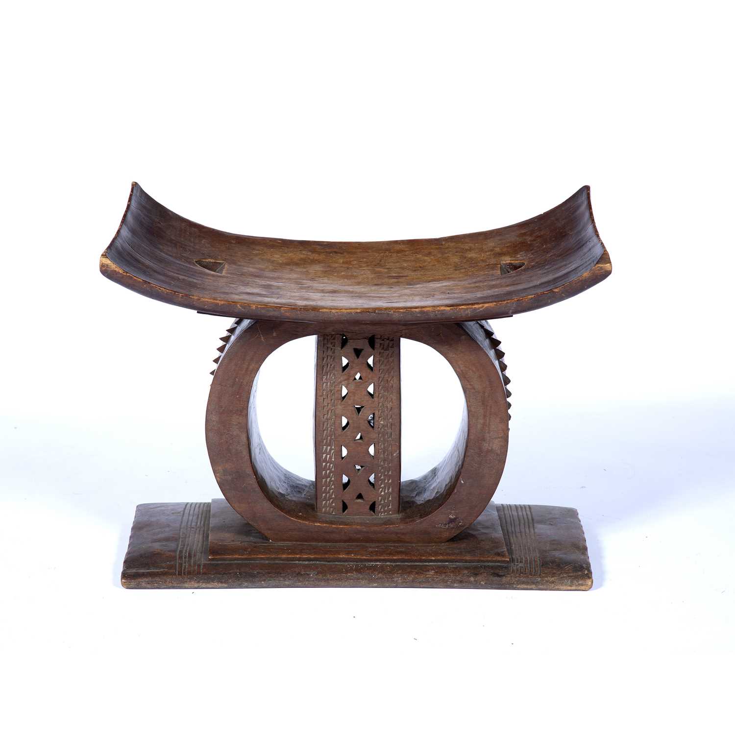 Ashanti stool with carved centre and rectangular base, 54cm x 27cm x 48cmCondition report: Chip to