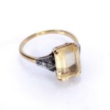 Yellow precious metal ring stamped '18ct' with large yellow centre stone and four diamonds, size Q/
