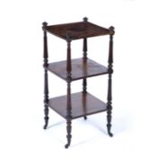 Rosewood Gillows style three tier whatnot 19th Century, with reeded columns and finials on