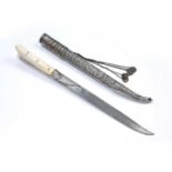 White metal and ivory handled dagger Cretan, embossed with foliate scrolls, the blade engraved and