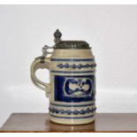 Westerwald saltglazed tankard 19th Century, with spread eagle design and hinged tin lid 19.5cm