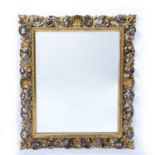 Florentine gilt wood wall mirror Italian, with foliate and shell border, 78cm x 70cm