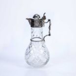 Silver-plated claret jug the lid and mount decorated with grapes and vines, 30cm high Condition
