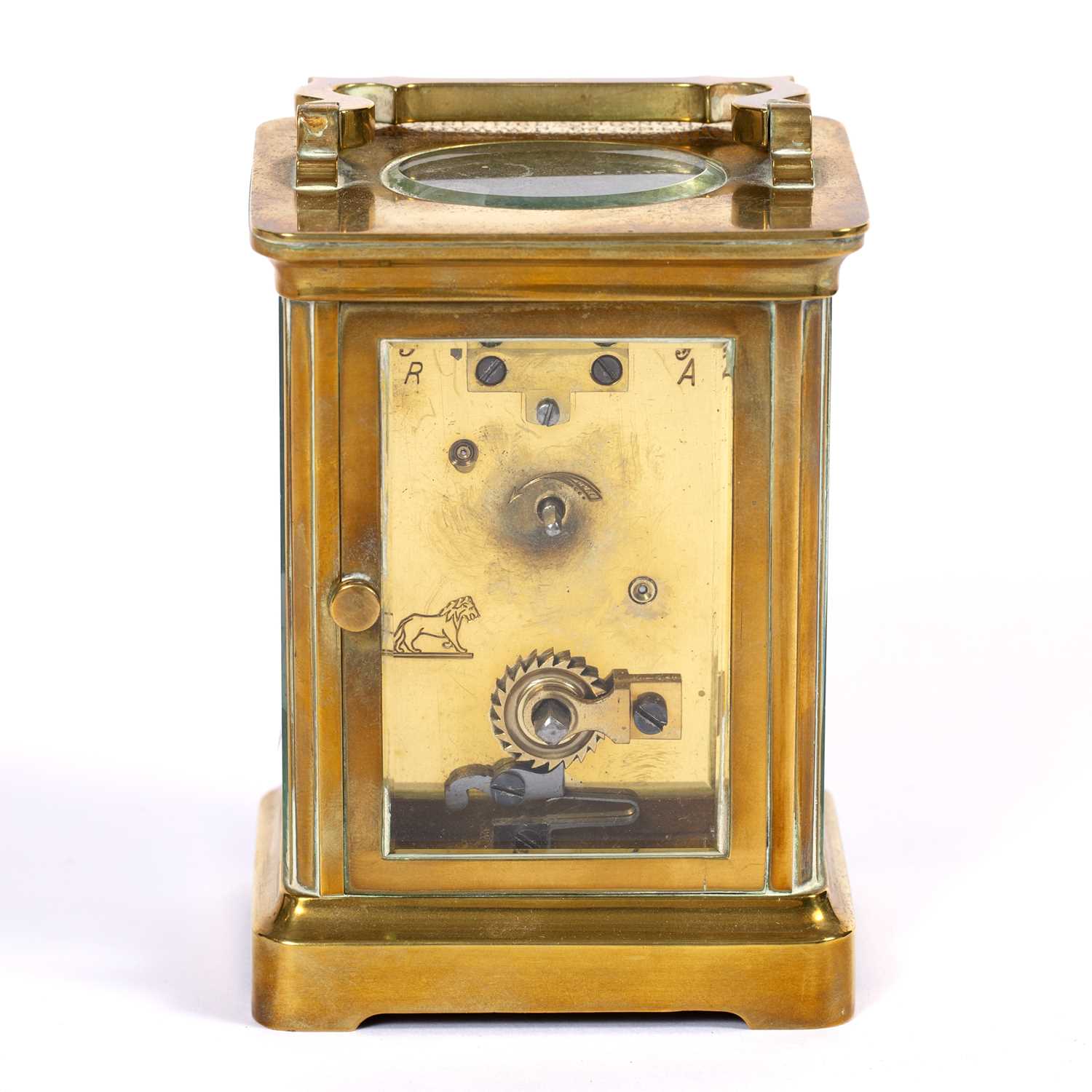 An early 20th century French brass carriage timepiece with white enamel dial, the plain case with - Image 4 of 5
