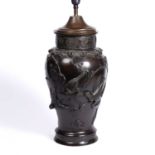 A Japanese bronze baluster lamp with raised bird decoration with Greek key, signed, 42cm