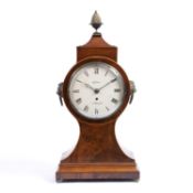 A 19th century mahogany and boxwood strung balloon bracket clock with brass pineapple finial and