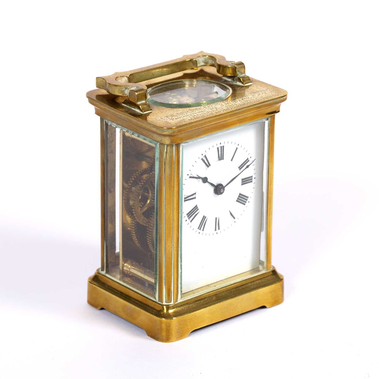 An early 20th century French brass carriage timepiece with white enamel dial, the plain case with - Image 2 of 5