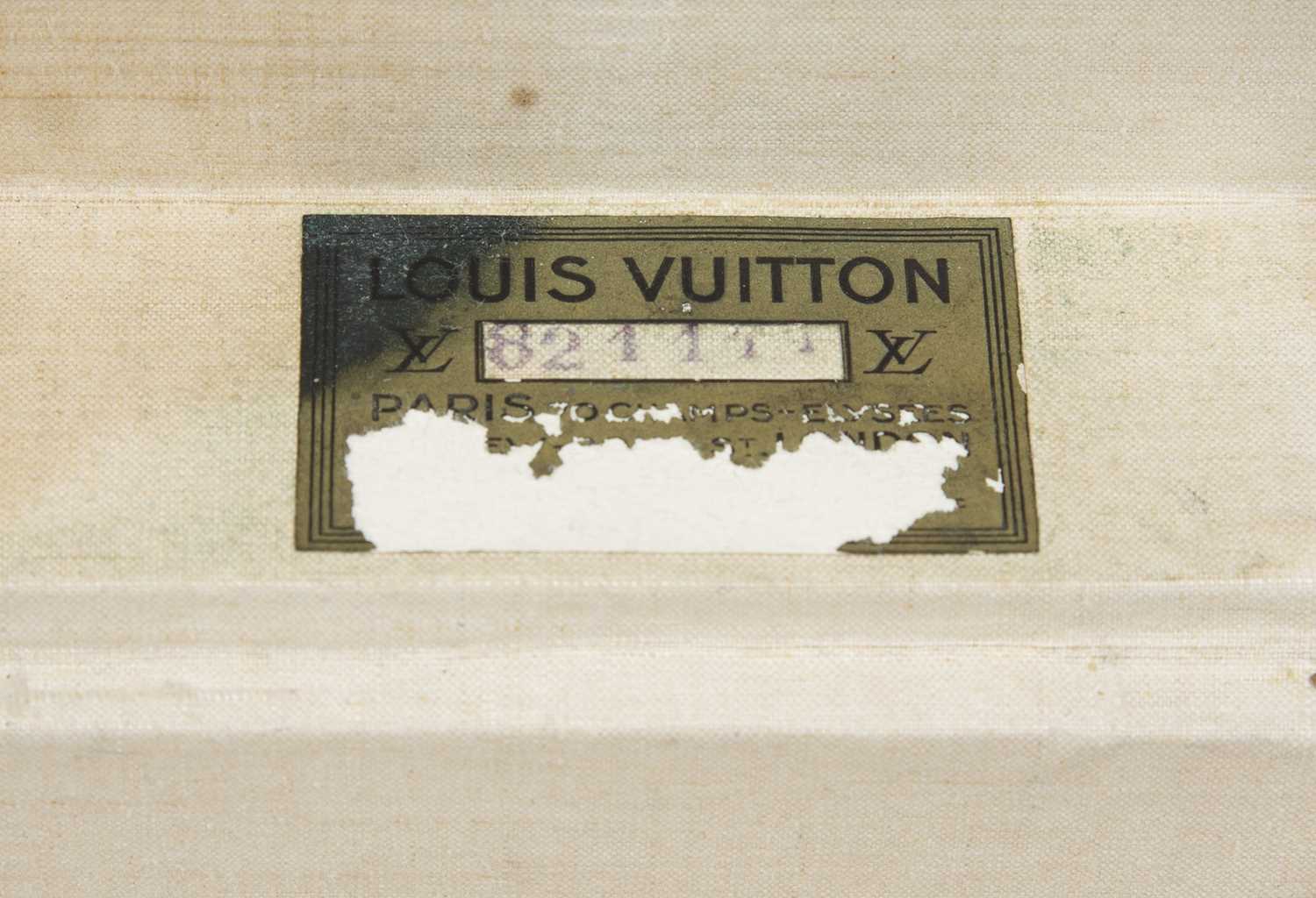 A vintage Louis Vuitton monogram small suitcase, with stamped brass lock and clasps, label to the - Image 4 of 5