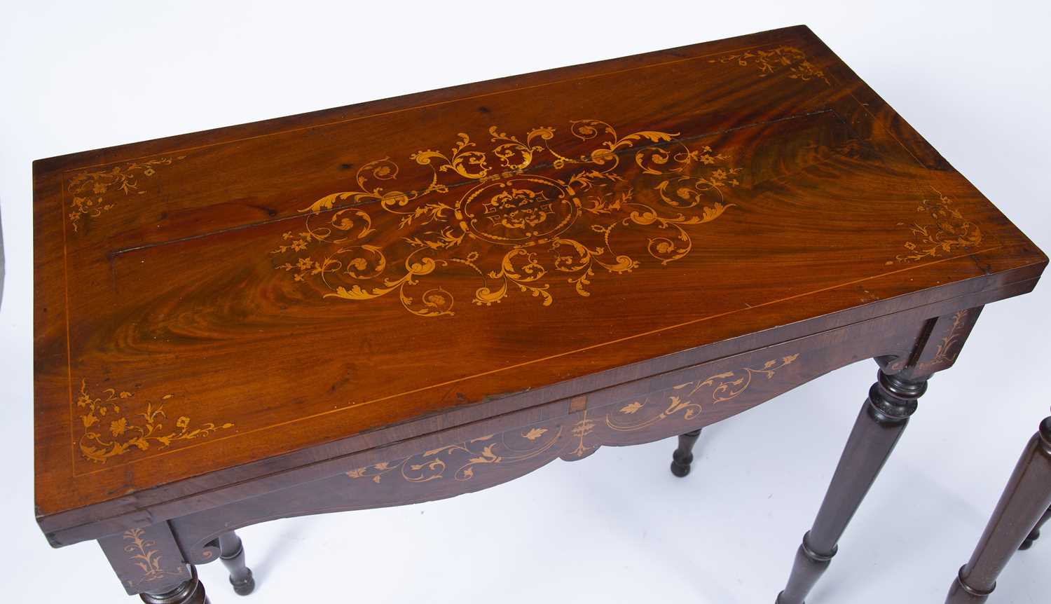 A pair of Victorian mahogany fold over top card tables, the tops inlaid with scrolling and flowering - Image 3 of 5